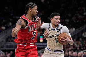 | Photo: AP/Morry Gash : Milwaukee Bucks' Ryan Rollins tries to get past Chicago Bulls' Dalen Terry during the second half of an NBA basketball game in Milwaukee.
