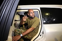 File photo : The Saudi-owned al-Arabiya television channel reported that Seif al-Islam was shot dead in the garden of his residence, citing sources close to the Gadhafi family.

