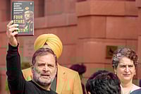 Rahul Gandhi Displays Naravane Memoir In Parliament, Claims PM Shed Responsibility | Photo: PTI/Shahbaz Khan : Leader of Opposition in the Lok Sabha Rahul Gandhi shows a copy of the unpublished "memoir" of former Army chief M M Naravane during the Budget Session of Parliament, in New Delhi. Congress MP Priyanka Gandhi Vadra also seen.