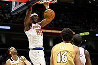 NBA 2026: New York Knicks Cruise Past Washington Wizards 132-101 For Seventh Straight Win | Photo: AP/John McDonnell : New York Knicks center Ariel Hukporti (55) dunks during the second half of an NBA basketball game against the Washington Wizards in Washington.