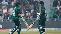 AP : Pakistan's Babar Azam, left, and Saim Ayub bat during the third T20I against Australia in Lahore.