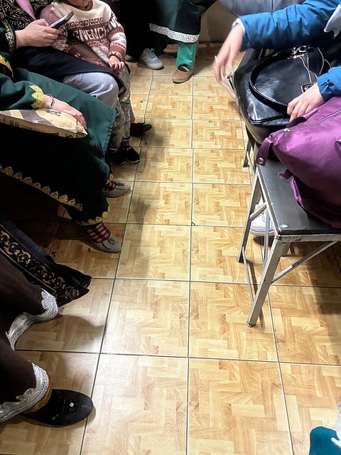 Patients in the waiting room at Dr Margoob’s clinic, at 5:30 pm.