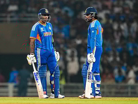 India's captain Suryakumar Yadav, left, with teammate Tilak Varma during the ICC Men's T20 World Cup warm-up cricket match between India and South Africa, at the DY Patil Sports Academy, in Navi Mumbai.