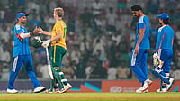 | Photo: PTI/Shashank Parade : India's captain Suryakumar Yadav and South Africa's Corbin Bosch exchange greetings after the former's team won the ICC Men's T20 World Cup warm-up cricket match against South Africa, at the DY Patil Sports Academy, in Navi Mumbai.