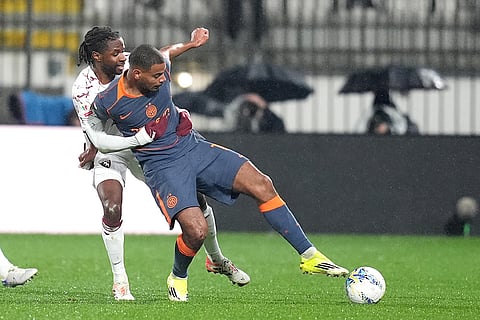Inter Milan's Andy Diouf, right, fights for the ball with Torino's Adrien Tameze during an Italian Cup soccer match in Monza, Italy.