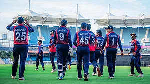 | Photo: X/CricketNep : Nepal players in action during the ICC T20 World Cup warm-up match agianst the UAE on February 3, 2026.