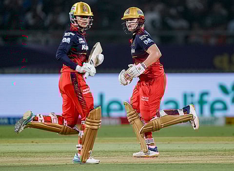 Royal Challengers Bengaluru's captain Smriti Mandhana and teammate Georgia Voll run between the wickets during the Women's Premier League (WPL) 2026 final T20 cricket match between Delhi Capitals and Royal Challengers Bengaluru, at Baroda Cricket Association Stadium, Kotambi in Vadodara, Gujarat.