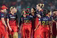| Photo: PTI/Kunal Patil : Royal Challengers Bengaluru's players celebrate after the team won the Women's Premier League (WPL) 2026 final T20 cricket match against Delhi Capitals, at Baroda Cricket Association Stadium, Kotambi in Vadodara, Gujarat.