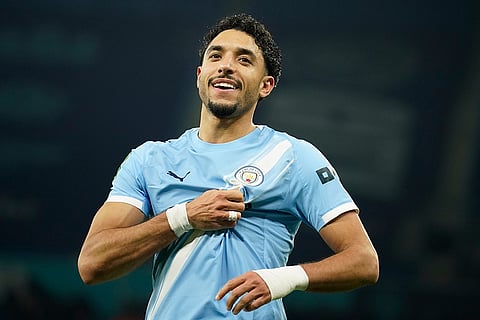 Manchester City's Omar Marmoush celebrates after scoring during the English League Cup semifinal soccer match soccer match between Manchester City and Newcastle in Manchester, England.