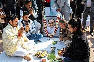 | Photo: PTI : Nationalist Youth Congress National President Dheeraj Sharma performs rituals before the immersion of the ashes of late Maharashtra Deputy Chief Minister Ajit Pawar, near VIP Ghat in Haridwar.