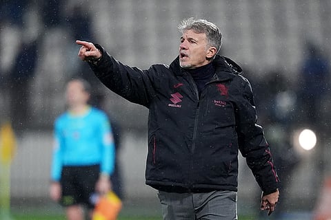 Torino's head coach Marco Baroni directs his team during an Italian Cup soccer match between Inter Milan and Torino in Monza, Italy.