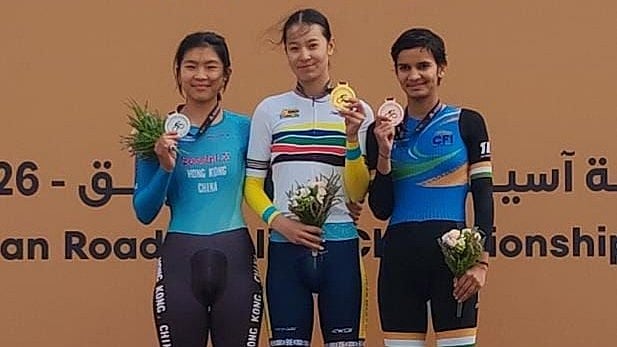 Anjali Jakhar (right) stands on the podium with her bronze medal at the Asian Road Cycling Championships in Qassim, Saudi Arabia. - Special Arrangement