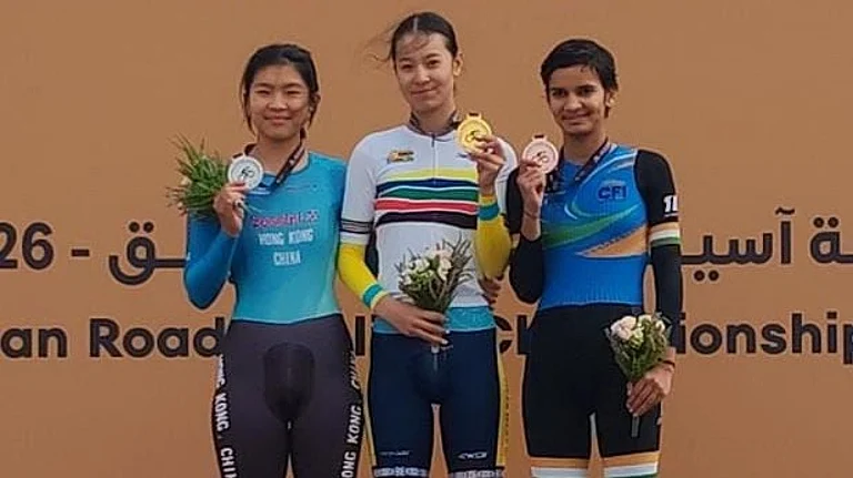 Anjali Jakhar (right) stands on the podium with her bronze medal at the Asian Road Cycling Championships in Qassim, Saudi Arabia. - Special Arrangement