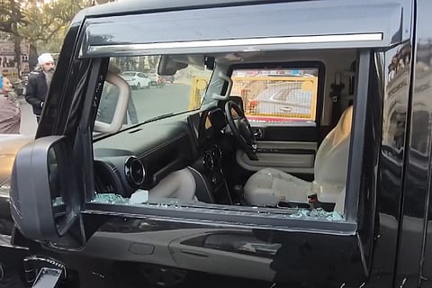 A Thar vehicle with shattered glass is seen outside a gurudwara after Aam Aadmi Party leader Lucky Oberoi was shot dead by unidentified assailants, at Model Town area, in Jalandhar, Punjab.