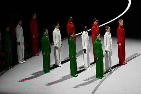 Artists perform during the Olympic opening ceremony at the 2026 Winter Olympics, in Milan, Italy, Friday, Feb. 6, 2026.