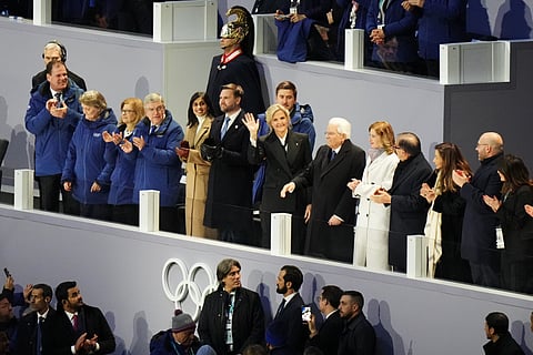 IOC President Kirsty Coventry, center, waves as she stands next to former IOC president Thomas Bach, Vice President JD Vance and second lady Usha Vance and Italian President Sergio Mattarella during the Olympic opening ceremony at the 2026 Winter Olympics, in Milan, Italy, Friday, Feb. 6, 2026.