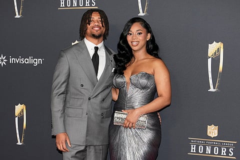 Atlanta Falcons' A.J. Terrell Jr., left, and Haley Amoree arrive for football's NFL Honors award show in San Francisco.
