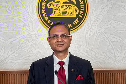 Reserve Bank of India (RBI) Governor Sanjay Malhotra addresses a press conference after the announcement of the sixth and final bi-monthly monetary policy for the current fiscal year, in Mumbai, Maharashtra.