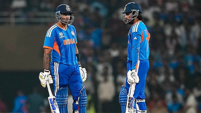 Captain Suryakumar Yadav, left, with teammate Tilak Varma during the ICC Men's T20 World Cup warm-up match between India and South Africa at the DY Patil Sports Academy in Navi Mumbai. - PTI