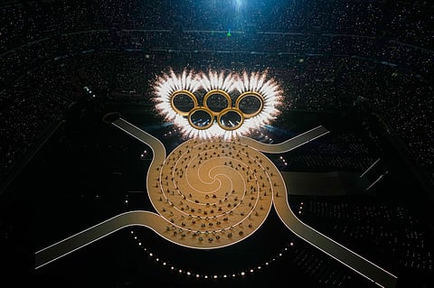 The Olympic rings are formed during the Olympic opening ceremony at the 2026 Winter Olympics, in Milan, Italy, Friday, Feb. 6, 2026. 