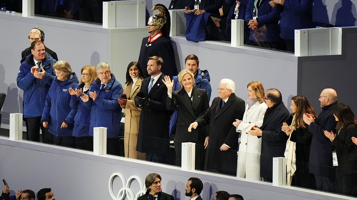 IOC President Kirsty Coventry, center, waves as she stands next to former IOC president Thomas Bach, Vice President JD Vance and second lady Usha Vance and Italian President Sergio Mattarella during the Olympic opening ceremony at the 2026 Winter Olympics, in Milan, Italy, Friday, Feb. 6, 2026.  - (AP Photo/Stephanie Scarbrough)