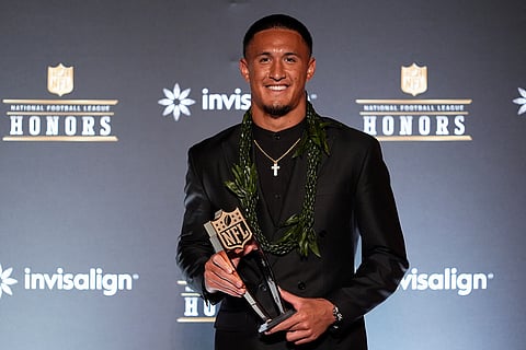 Carolina Panthers' Tetairoa McMillan smiles after winning AP Offensive Rookie of the Year award during football's NFL Honors award show in San Francisco.