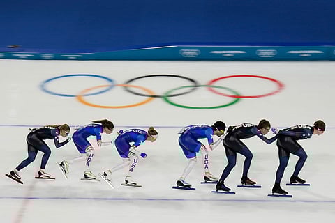 United States' women's and men's team pursuit speed skaters warm up, at the 2026 Winter Olympics, in Milan, Italy.