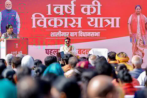 Delhi Chief Minister Rekha Gupta speaks at a public meeting, highlighting ongoing development works in the constituency, at Jan Seva Sadan, Shalimar Bagh, in New Delhi. 