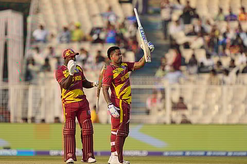 West Indies' Shimron Hetmyer celebrates his fifty runs during the T20 World Cup cricket match between Scotland and West Indies in Kolkata.
