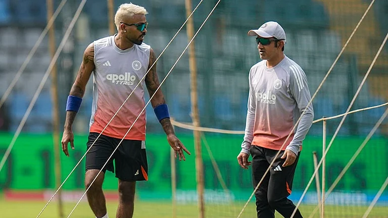India's Hardik Pandya with head coach Gautam Gambhir during a training session ahead of the ICC Men's T20 World Cup 2026 cricket match against USA, in Mumbai. - | Photo: PTI/Shashank Parade