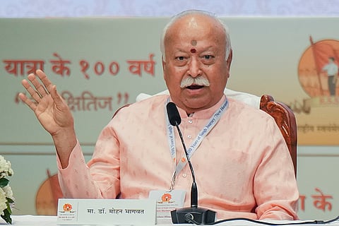RSS chief Mohan Bhagwat addresses a gathering during the 'New Horizons' lecture series marking the organization's centenary year, in Mumbai.