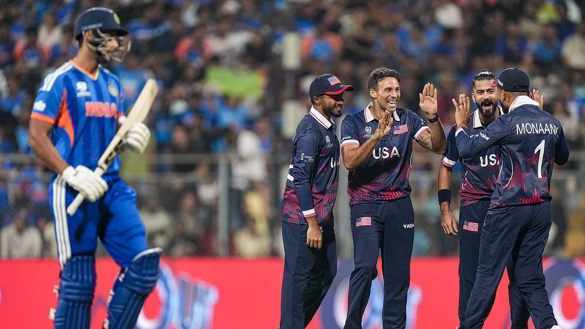 (PTI Photo/Kunal Patil) : USA's players celebrate the dismissal of India's Shivam Dube during the ICC Men's T20 World Cup 2026 cricket match between India and USA, at the Wankhede Stadium, in Mumbai, Saturday, Feb. 7, 2026. 