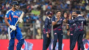 (PTI Photo/Kunal Patil) : USA's players celebrate the dismissal of India's Shivam Dube during the ICC Men's T20 World Cup 2026 cricket match between India and USA, at the Wankhede Stadium, in Mumbai, Saturday, Feb. 7, 2026.
