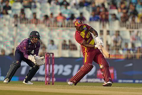 West Indies' Rovman Powell plays a shot during the T20 World Cup cricket match between Scotland and West Indies in Kolkata.
