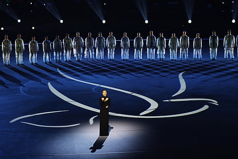 Actress and UN Peace Ambassador Charlize Theron gives a speech at the Olympic opening ceremony at the 2026 Winter Olympics in Milan, Italy.