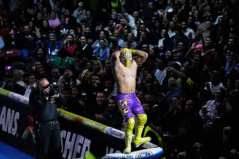 Lucha Libre wrestler Capitan Suicida poses during a fight against Yutani at the Arena Mexico in Mexico City.