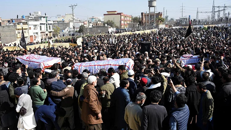 People gather to attend a funeral for victims following the explosion at a mosque, in Islamabad, Pakistan, on February 7, 2026 - Reuters