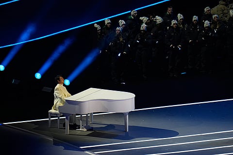 Chinese pianist Lang Lang performs during the Olympic opening ceremony at the 2026 Winter Olympics, in Milan, Italy.