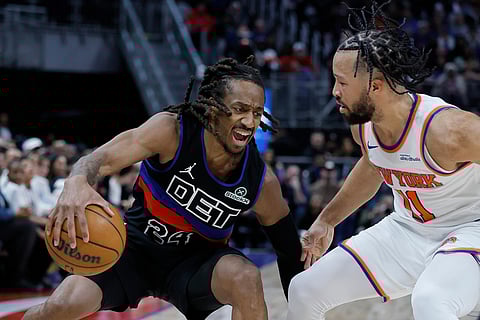 Detroit Pistons guard Daniss Jenkins (24) drives against New York Knicks guard Jalen Brunson (11) during the second half of an NBA basketball game in Detroit. 