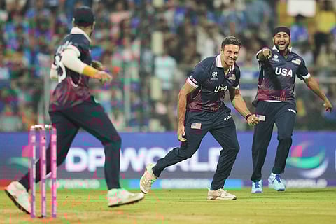 United States' Shadley Van Schalkwyk, center, celebrates with teammates the wicket of India's Shivam Dube during the T20 World Cup cricket match between India and the United States in Mumbai.