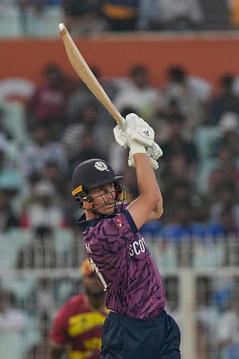Scotland's Brandon McMullen plays a shot during the T20 World Cup cricket match between Scotland and West Indies in Kolkata.