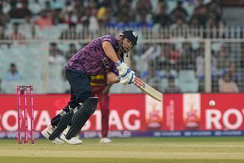 Scotland's George Munsey plays a shot during the T20 World Cup cricket match between Scotland and West Indies in Kolkata.