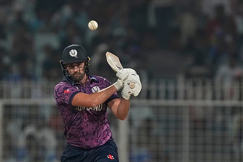 Scotland's Tom Bruce plays a shot during the T20 World Cup cricket match between Scotland and West Indies in Kolkata.