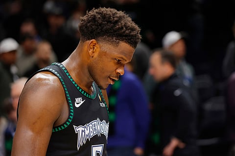 Minnesota Timberwolves guard Anthony Edwards leaves the court after his team lost to the New Orleans Pelicans in an NBA basketball game in Minneapolis.