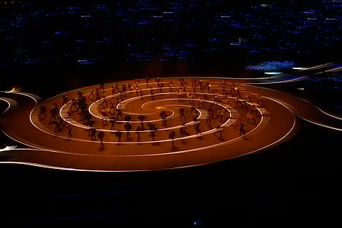 Dancers perform during the Olympic opening ceremony at the 2026 Winter Olympics, in Milan, Italy.