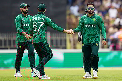 Pakistan's Mohammad Nawaz, right, celebrates with teammates the wicket of Netherlands' Bas de Leede during the T20 World Cup cricket match between Netherlands and Pakistan in Colombo, Sri Lanka.