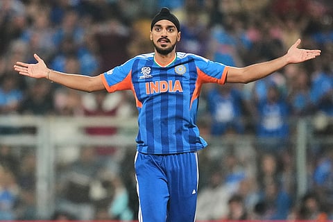 India's Arshdeep Singh celebrates the wicket of United States' captain Monank Patel during the T20 World Cup cricket match between India and the United States in Mumbai.
