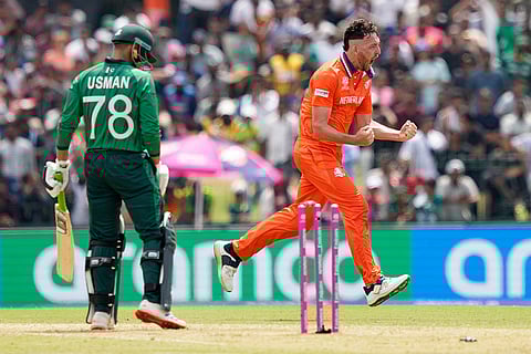Netherlands' Paul van Meekeren, right, celebrates the wicket of Pakistan's Usman Khan, left, during the T20 World Cup cricket match between Netherlands and Pakistan in Colombo, Sri Lanka.