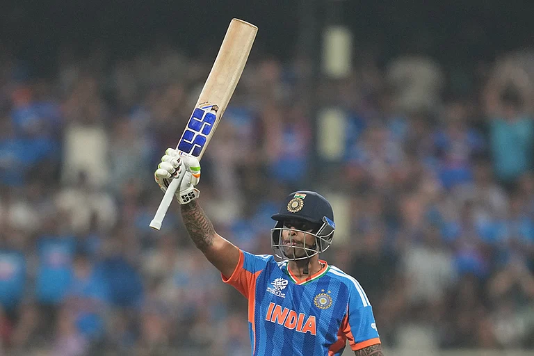 India's captain Suryakumar Yadav celebrates his fifty runs during the T20 World Cup cricket match between India and the United States in Mumbai. - | Photo: AP/Rafiq Maqbool