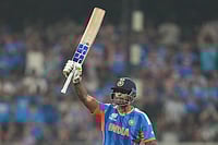 | Photo: AP/Rafiq Maqbool : India's captain Suryakumar Yadav celebrates his fifty runs during the T20 World Cup cricket match between India and the United States in Mumbai.